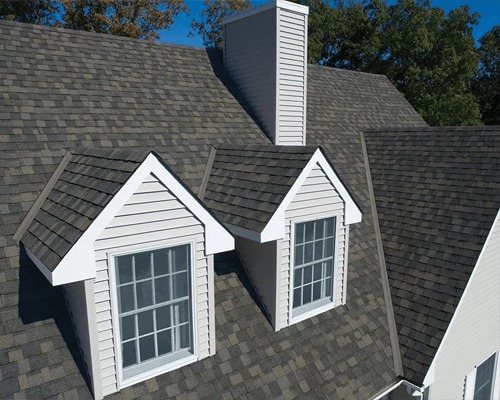 a roof of a house with a chimney