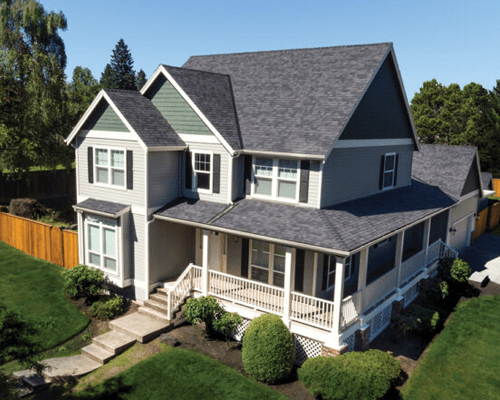 a house with a yard and trees